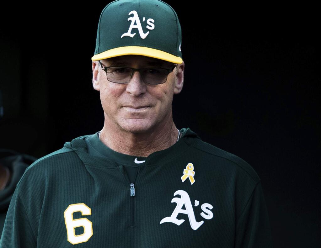 Oakland Athletics manager Bob Melvin watches the field before a game against the Detroit Tigers, Saturday, Sept. 7, 2019 in Oakland. (AP Photo/John Hefti)
