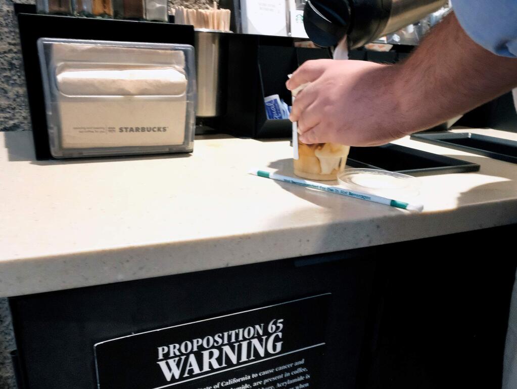 The state is issuing new regulations that will drop a requirement for warning labels on coffee. (RICHARD VOGEL / Associated Press)