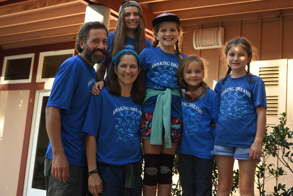 Chris and Jamie Malone with their four daughters, from left, Maya, 12, Harper, 10, Sabina, 6, and Josie, 8, during an evening presentation about the family's 164-day, 2,200 mile hiking adventure through the entire Appalachian Trail held Friday at Community Church of Sebastopol United Church of Christ in Sebastopol, California. September 27, 2019.(Photo: Erik Castro/for The Press Democrat)