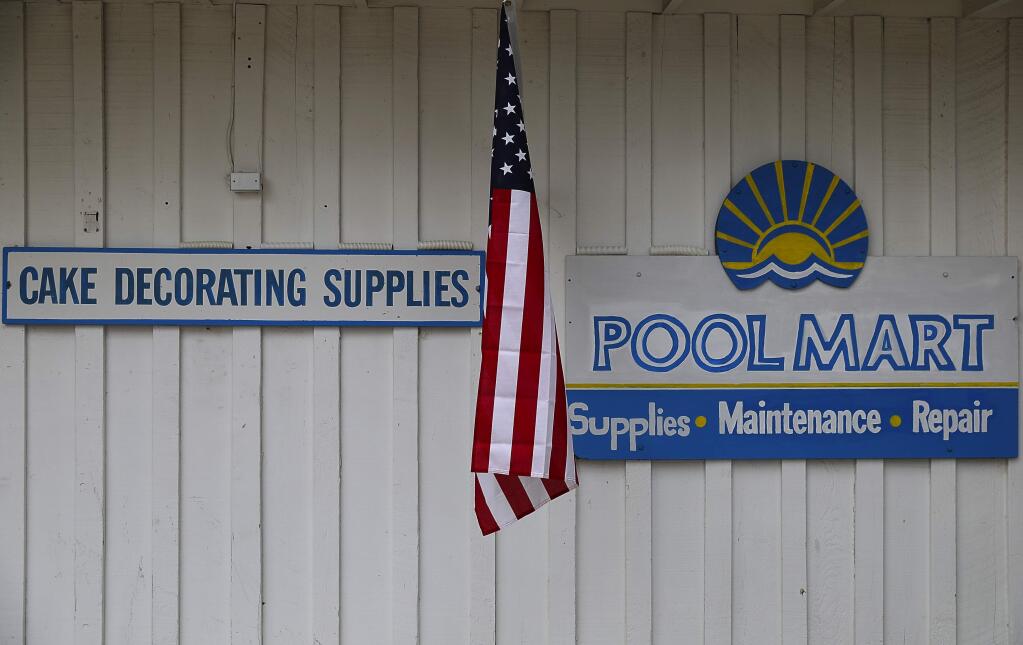 Lillian Brunton's two businesses, Pool Mart and Lil's Cake Corner, occupy the same building along Sonoma Highway, near Sonoma. (Christopher Chung/ The Press Democrat)