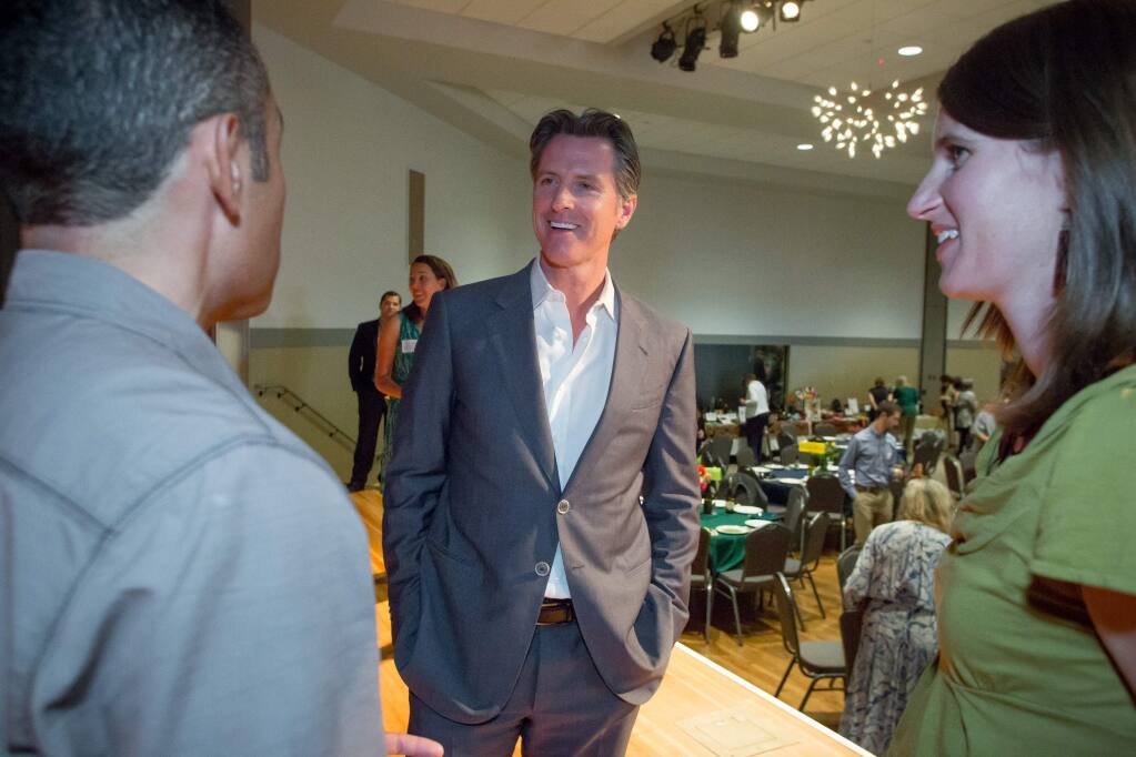 California Lt. Governor Gavin Newsom greets guests to the Conservation Action's Annual Grassroots Gala, in Santa Rosa, Calif. Saturday, June 10th, 2017. Newsom was the event's keynote speaker. (Jeremy Portje / For The Press Democrat)