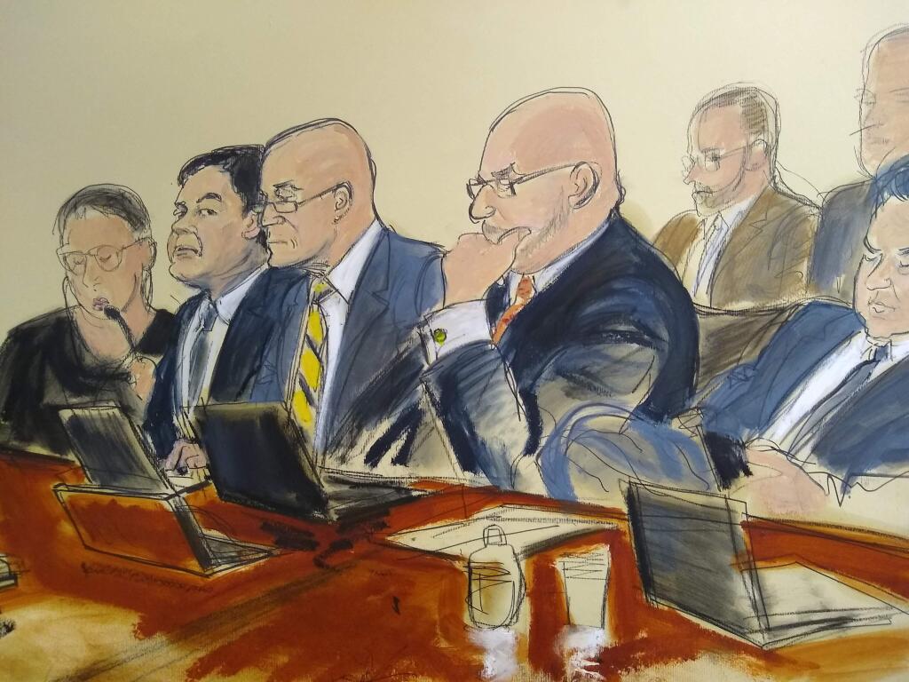 In this courtroom drawing, Joaquin 'El Chapo' Guzman, second from left, seated with his defense attorneys, listens to testimony that was read back to the jury, Monday, Feb. 11, 2019, in New York. On its fifth day of deliberations, the jury asked to review law enforcement testimony about seizures of Colombian cocaine being shipped to the Sinaloa cartel to fuel a smuggling empire prosecutors say was under Guzman's command. (Elizabeth Williams via AP)
