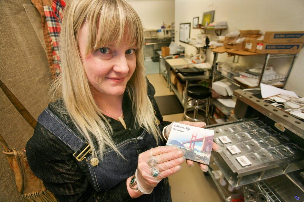 Rae Vittorelli, Owner and founder of Cocoagraph, with one of her photo chocolates in her store in Petaluma on Monday, February 23, 2015. (SCOTT MANCHESTER/ARGUS-COURIER STAFF)