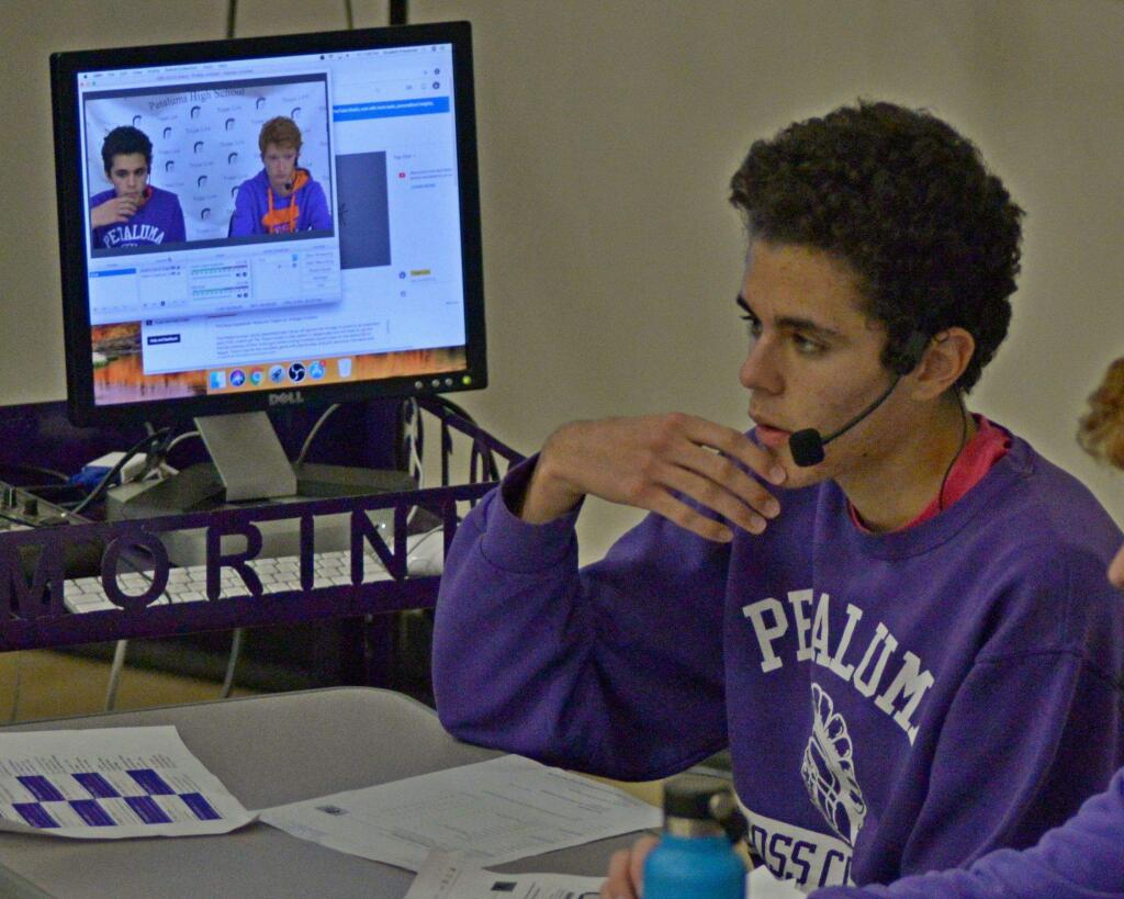 SUMNER FOWLER/FOR THE ARGUS-COURIERGriffin Epstein calls a game for the a Petaluma High School Trojan Live production. Epstein produces live programs for many Petaluma High sporting events.