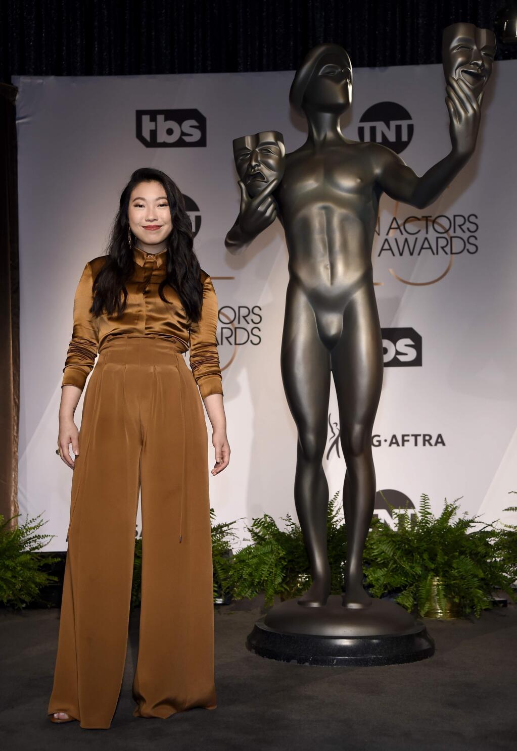 Awkwafina poses following the nominations announcement for the 25th annual Screen Actors Guild Awards at the Pacific Design Center on Wednesday, Dec. 12, 2018, in West Hollywood, Calif. The show will be held on Sunday, Jan. 27, 2019, in Los Angeles. (Photo by Chris Pizzello/Invision/AP)