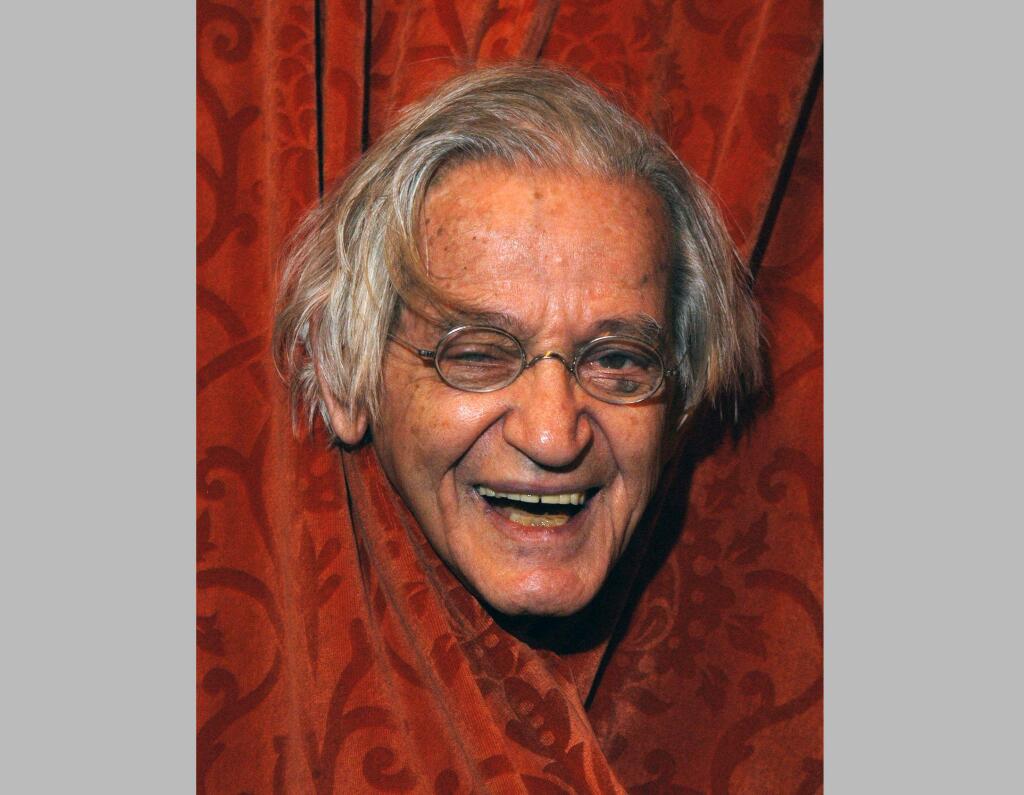 FILE - This April 24, 2004 file photo shows comedian Irwin Corey at the Ethel Barrymore Theatre in New York. Corey, the wild-haired comedian and actor who was known for his nonsensical style and who billed himself as “The World's Foremost Authority,” died Monday, Feb. 6, 2017, at his home in Manhattan. He was 102. (AP Photo/Jim Cooper, File)