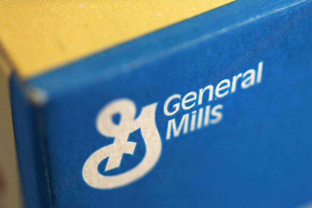 FILE - This Sept. 20, 2011, file photo shows a box of General Mills' Fiber One cereal, in Philadelphia. General Mills is buying Blue Buffalo Pet Products Inc. in a deal valued at about $8 billion.General Mills Inc. will pay $40 per Blue Buffalo share. That's a 17 percent premium to the pet food company's Thursday, Feb. 22, 2018 closing price of $34.12. (AP Photo/Matt Rourke, File)