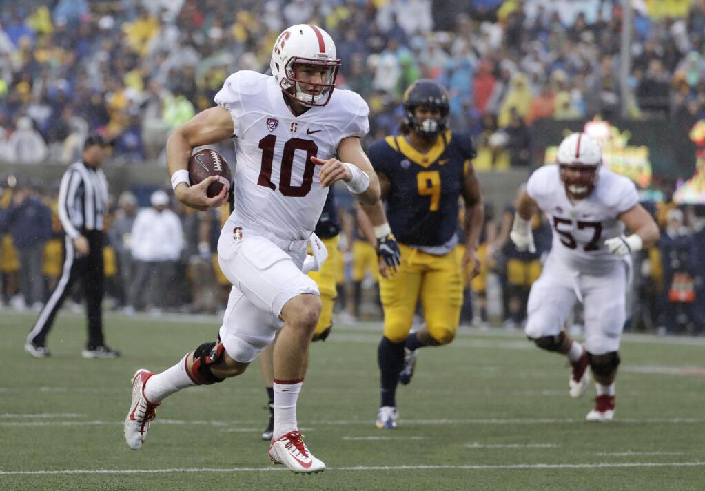 Stanford quarterback Keller Chryst (10) runs for a touchdown against California during the first half of an NCAA college football game Saturday, Nov. 19, 2016, in Berkeley, Calif. (AP Photo/Marcio Jose Sanchez)