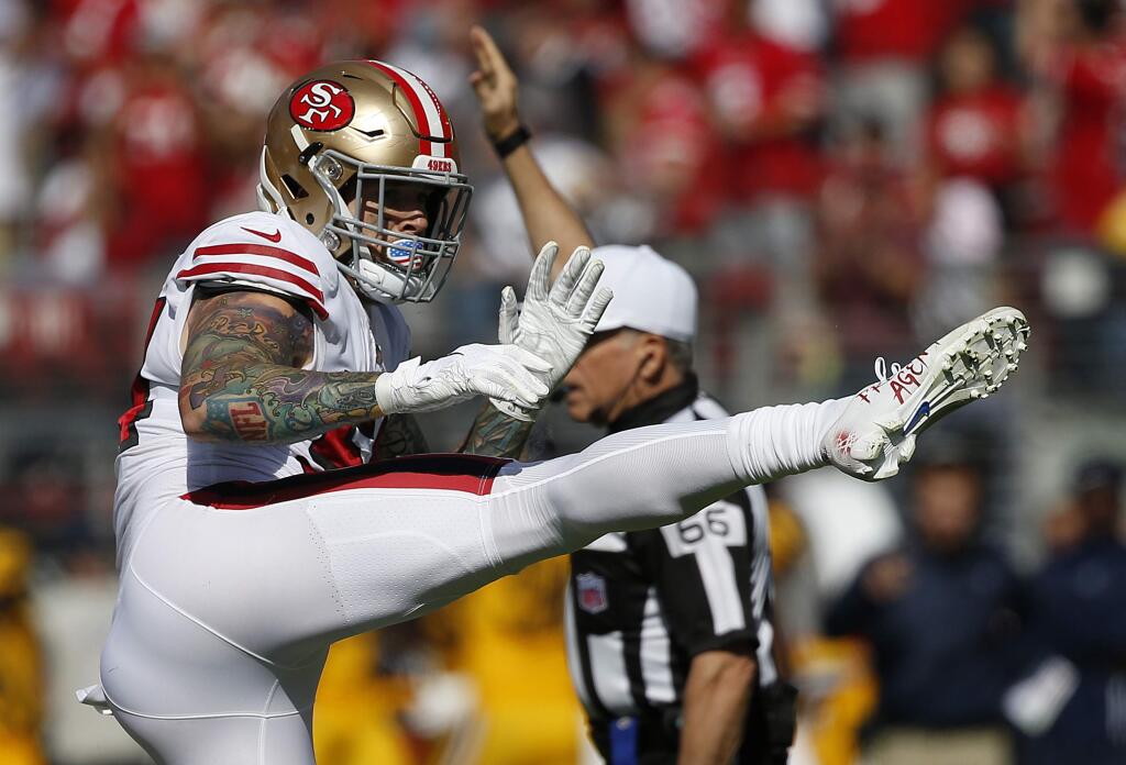 San Francisco 49ers defensive end Cassius Marsh celebrates after sacking Los Angeles Rams quarterback Jared Goff during the first half in Santa Clara, Sunday, Oct. 21, 2018. (AP Photo/Josie Lepe)