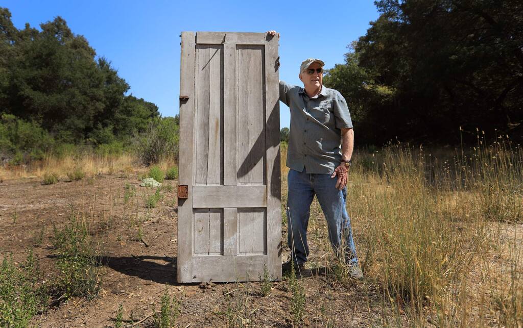 A door and fencing is about all that remains of the historic Hoag House, owned by Dick Carlile, that sat for years near Trione-Annadel State Park. The structure had to be demolished due to the dilapidated state of the home. Carlile hopes to rebuild the home at Juilliard Park in Santa Rosa from detailed plans. (Kent Porter / The Press Democrat) 2017