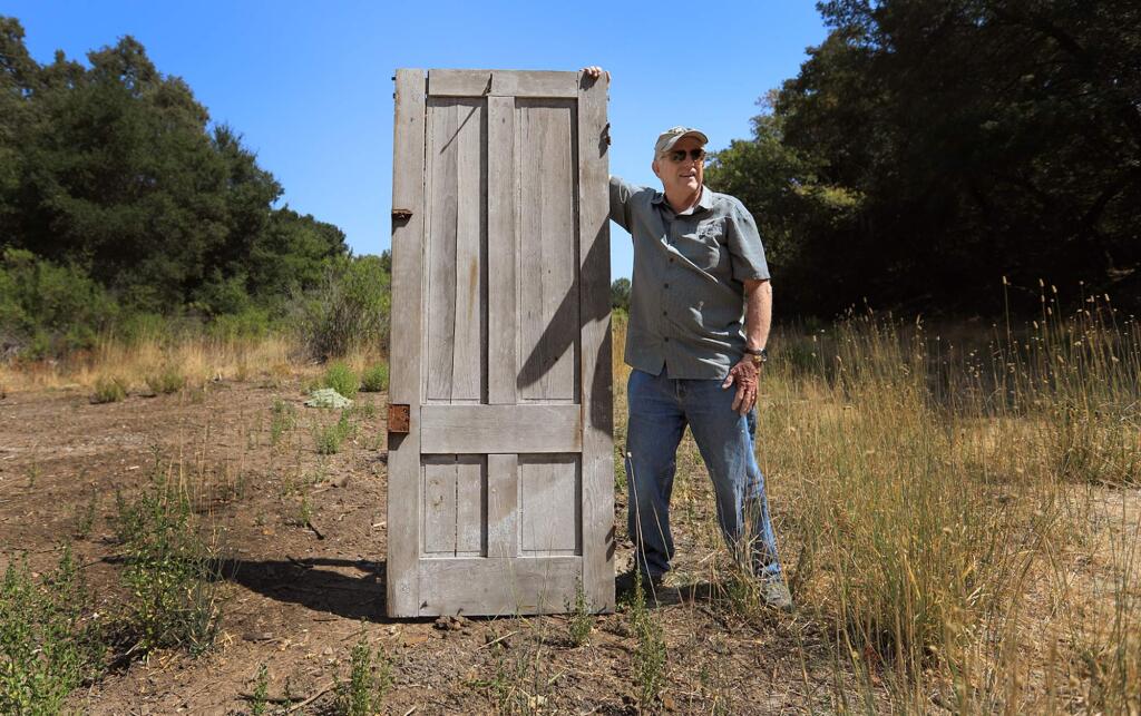 A door and fencing is about all that remains of the historic Hoag House, owned by Dick Carlile, that sat for years near Trione-Annadel State Park. The structure had to be demolished due to the dilapidated state of the home. Carlile hopes to rebuild the home at Juilliard Park in Santa Rosa from detailed plans. (Kent Porter / The Press Democrat) 2017