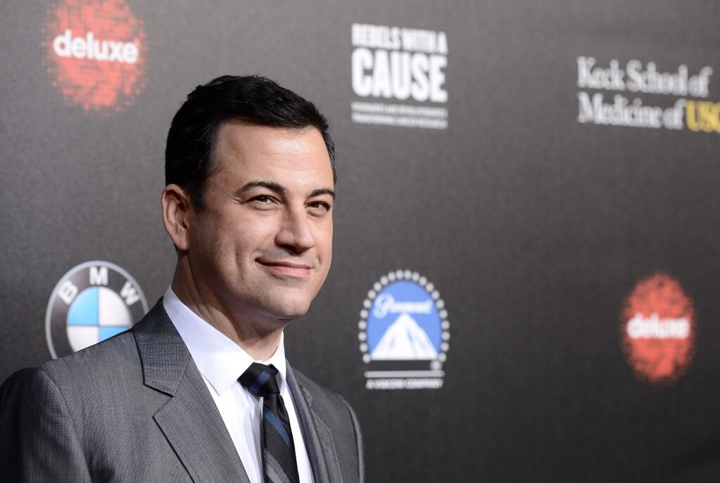 FILE - In this March 20, 2014, file photo, television personality and event host Jimmy Kimmel attends the 2nd Annual 'Rebels With a Cause' Gala benefiting the USC Center for Applied Molecular Medicine at Paramount Pictures Studios in Los Angeles.(Photo by Dan Steinberg/Invision/AP, File)
