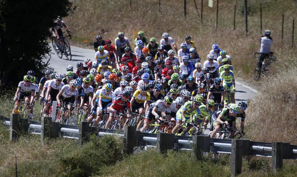 Cyclists ride up Calaveras Road during the Stage 3 of the Amgen Tour of California near Milpitas, Calif., Tuesday, May 12, 2015. (Patrick Tehan/San Jose Mercury News via AP) MAGS OUT; NO SALES; MANDATORY CREDIT