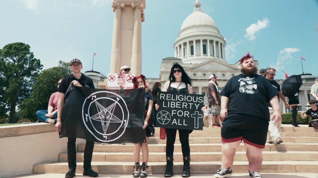 Supporters of the Satanic Temple at a rally for religious liberty in Little Rock, Ark., in 2018 as seen in “Hail Satan?” (Magnolia Pictures)