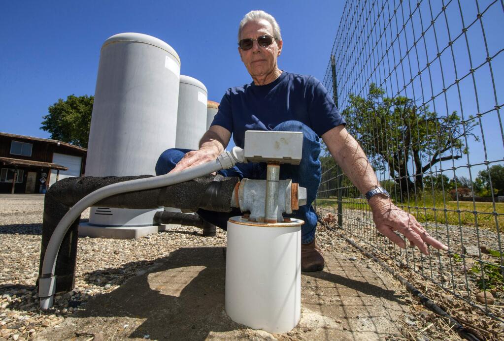 Ray Larbre, of Larbre Well Drilling & Pumps, at one of three wells on his Arnold Drive property. This well reaches a depth of 1,000 feet and is used to monitor static water levels on the west side of the Valley. Larbre, who's been keeping records since the 1990s, measures these levels twice a year, in the spring and in the fall, and says that since he started keeping records, the water level has declined about 60 feet. (Robbi Pengelly/Index-Tribune)