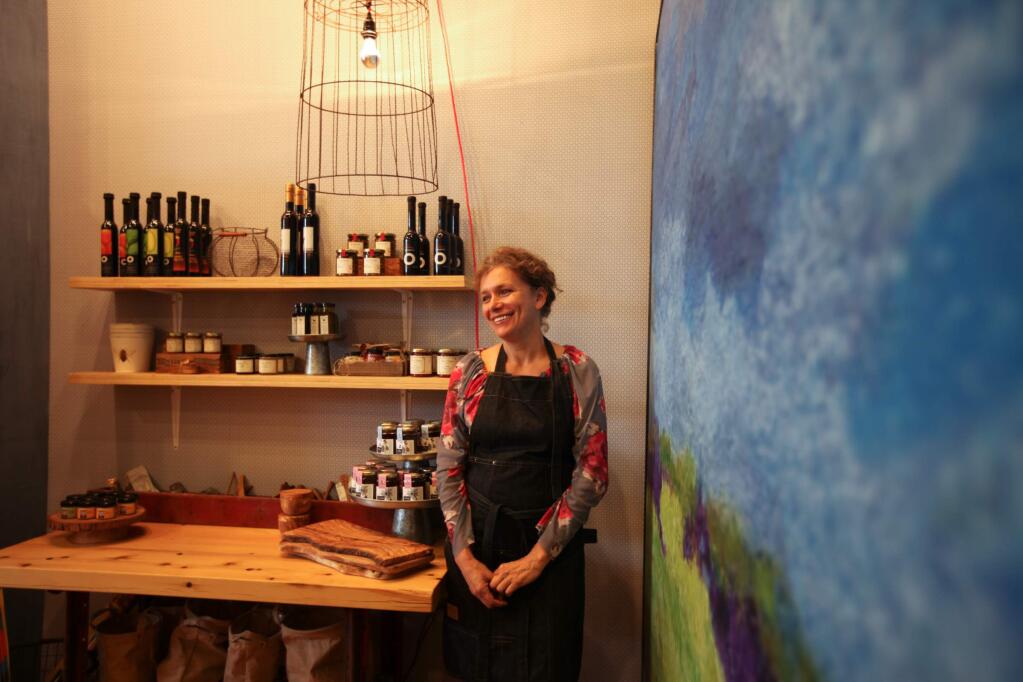 Suzanne Alexandre stands behind her local product at the re-newed free Range store in Petaluma. (Victoria Webb/For The Argus-Courier)