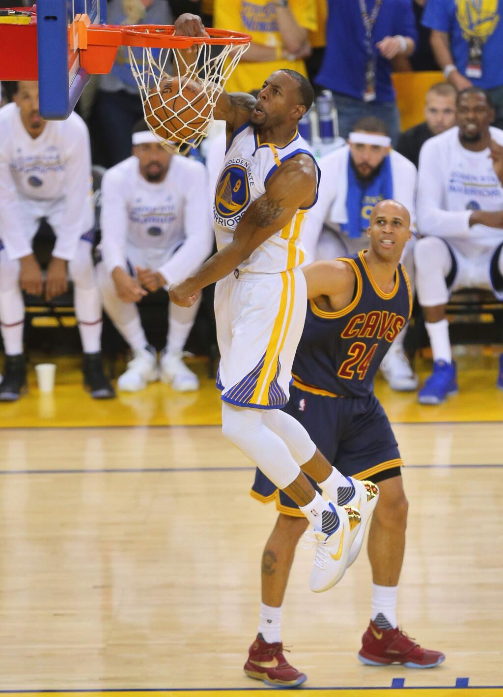 Golden State Warriors forward Andre Iguodala dunks the ball over Cleveland Cavaliers forward Richard Jefferson during game 1 of the NBA Finals in Oakland on Thursday, June 1, 2017. The Warriors defeated the Cavaliers 113-91.(Christopher Chung/ The Press Democrat)