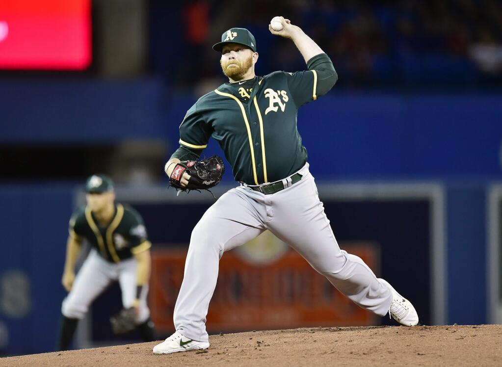 Oakland Athletics starting pitcher Brett Anderson delivers against the Toronto Blue Jays during first-inning baseball game action in Toronto, Friday, May 18, 2018. (Frank Gunn/The Canadian Press via AP)