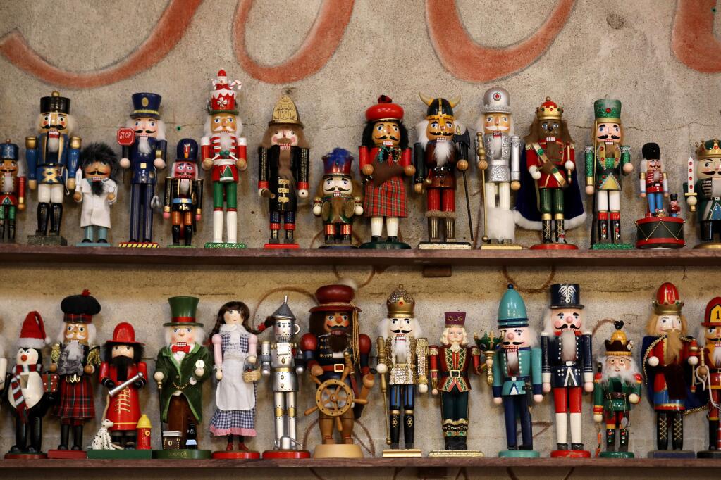 A huge variety of nutcrackers decorate the shelves at Costeaux's French Bakery in Healdsburg on Tuesday, November 26, 2019. (BETH SCHLANKER/ The Press Democrat)