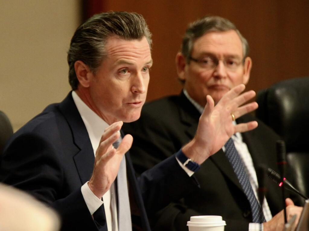 Lt. Gov. Gavin Newsom, left, asks the CSU Board of Trustees to reject the proposed tuition hike Wednesday, March 22, 2017 in Long Beach, Calif. (Iran Khan/Los Angeles Times/TNS)