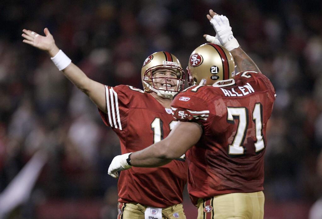 Shaun Hill high fives Larry Allen after the 9ers first score. The San Francisco 49ers played the Cincinati Bengals on Saturday, December 15, 2007. photo by John Burgess/The Press Democrat