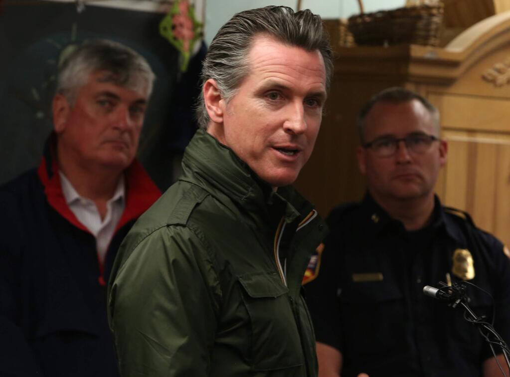 Gov. Gavin Newsom speaks at a press conference at the Sonoma-Marin Fairgrounds on Sunday, Oct. 27, 2019 in Petaluma. He just finished touring the facility, which provides comfort and care for people fleeing area fires. (Frankie Frost/Special to the Press Democrat)