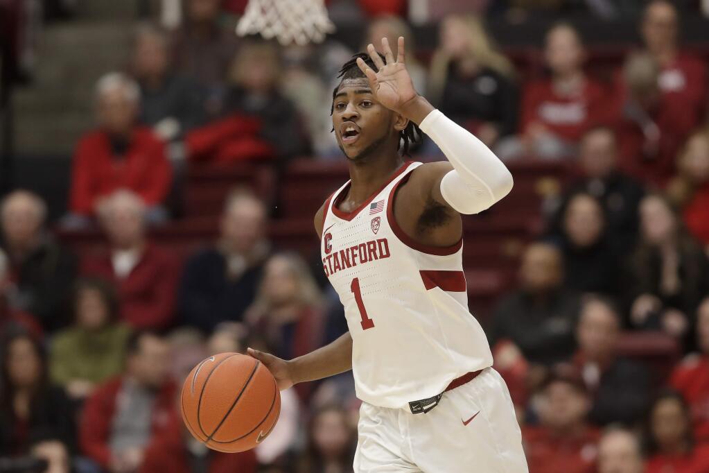 Stanford guard Daejon Davis brings the ball up during the first half of the team's game against Cal in Stanford, Thursday, Jan. 2, 2020. (AP Photo/Jeff Chiu)