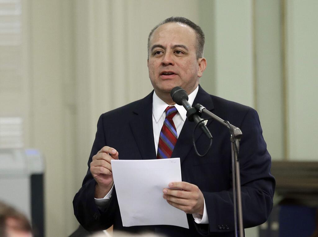 FILE - In this May 4, 2017, file photo, Assemblyman Raul Bocanegra, D-Los Angeles, speaks at the Capitol in Sacramento, Calif. Bocanegra said Monday, Nov. 20, 2017, he won't seek re-election following allegations he sexually harassed a colleague. (AP Photo/Rich Pedroncelli, File)