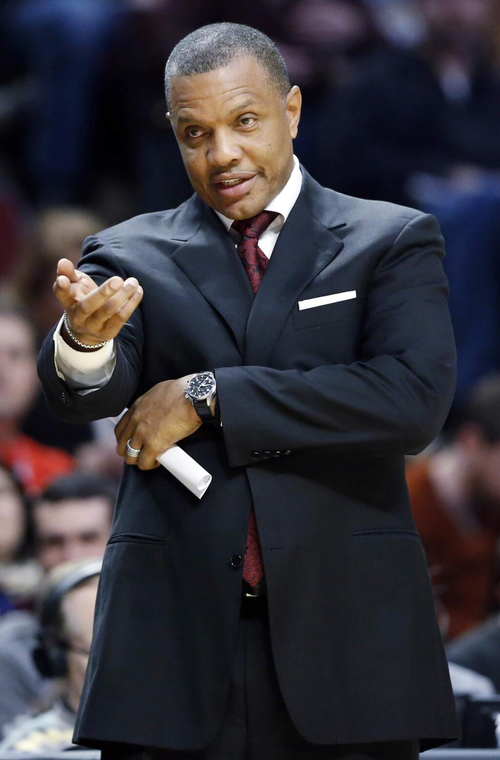 In this Saturday, Jan. 12, 2013 file photo, Phoenix Suns coach Alvin Gentry gestures during the first half of the Suns' NBA basketball game against the Chicago Bulls in Chicago. A person familiar with the situation says the New Orleans Pelicans have hired Golden State Warriors assistant Alvin Gentry as head coach, Saturday, May 30, 2015. (AP Photo/Nam Y. Huh, File)