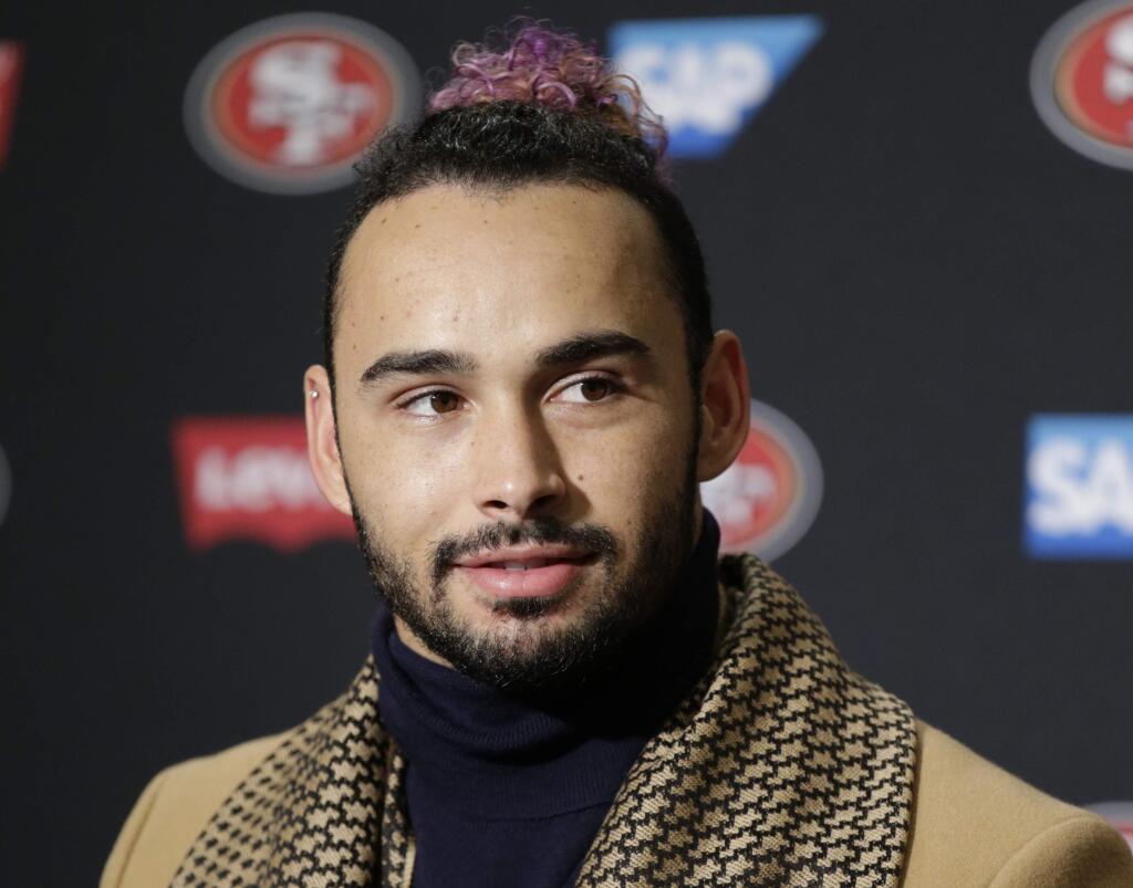 San Francisco 49ers wide receiver Dante Pettis talks to reporters following a game against the Seattle Seahawks, Sunday, Dec. 2, 2018, in Seattle. The Seahawks won 43-16. (AP Photo/John Froschauer)