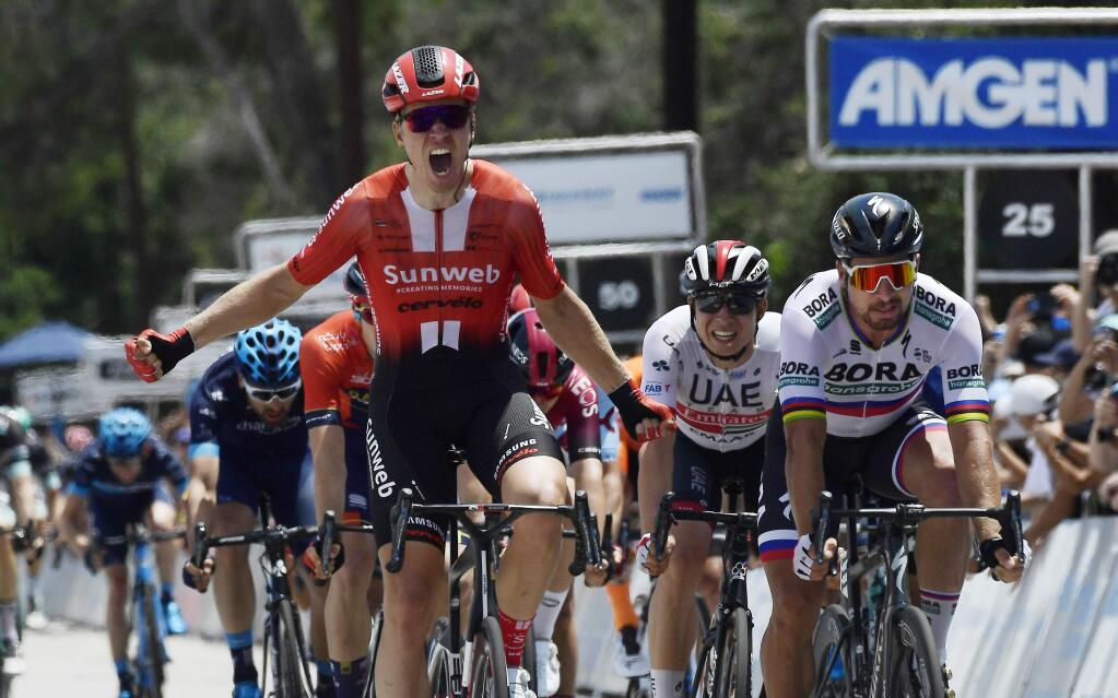 Cees Bol, left, of the Netherlands, edges out Peter Sagan, right, of Slovakia, to win the seventh and final stage of the Tour of California bicycle race Saturday, May 18, 2019, in Pasadena, Calif. (AP Photo/Mark J. Terrill)