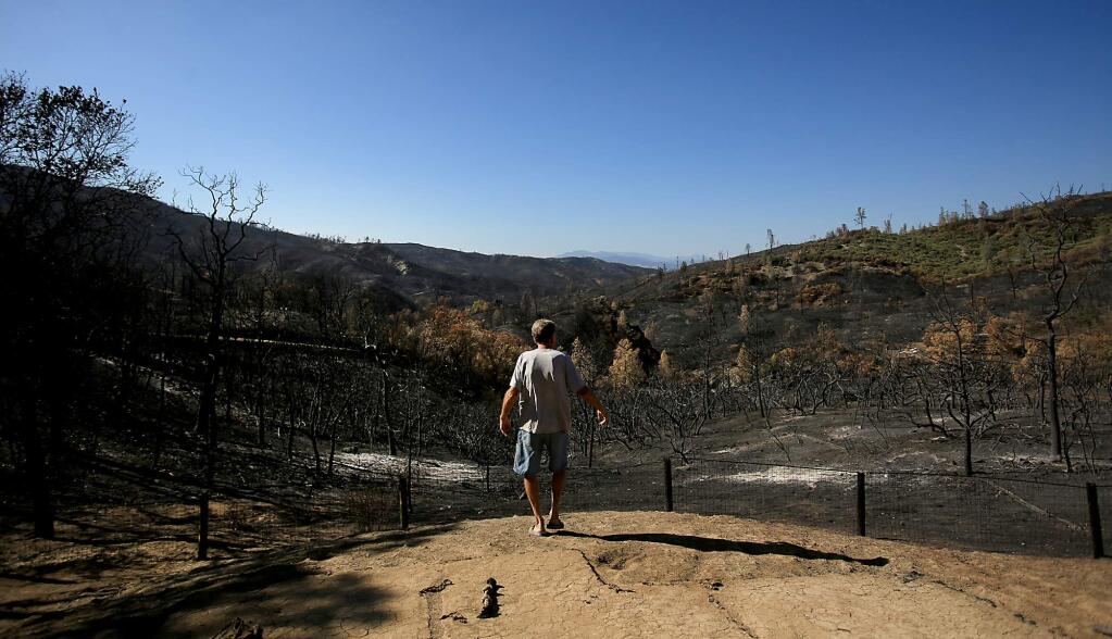 A charred landscape is all that remains of Bill Hilbrandie's homestead, destroyed by the Rocky Fire in Lake County, Tuesday Sept. 1, 2015. (Kent Porter / Press Democrat) 2015
