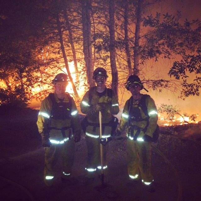 From left, firefighters Ryan Hamilton, Pat Bradley and Kevin Powell of the Wilmar Volunteer Fire Department, pause while battling a wildfire in Humboldt County. (Courtesy Wilmar Volunteer Fire Department)