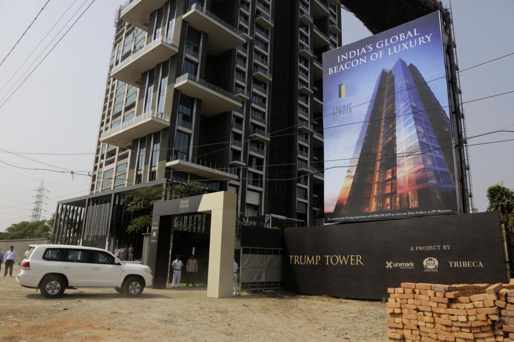 Son of U.S. President Donald Trump, Donald Trump Jr.'s convoy arrives at the construction site of the Trump Tower project in Kolkata, India, Wednesday, Feb. 21, 2018. While on a visit to India promoting the real estate, Donald Trump Jr. said any talk that his family was profiting from his father's presidency was 'nonsense.' (AP Photo/Bikas Das)