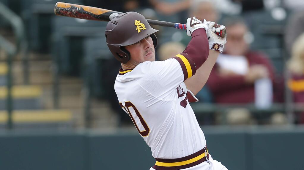 In this Feb. 17, 2019, file photo, Arizona State first baseman Spencer Torkelson bats against Notre Dame in Phoenix. (AP Photo/Rick Scuteri, File)