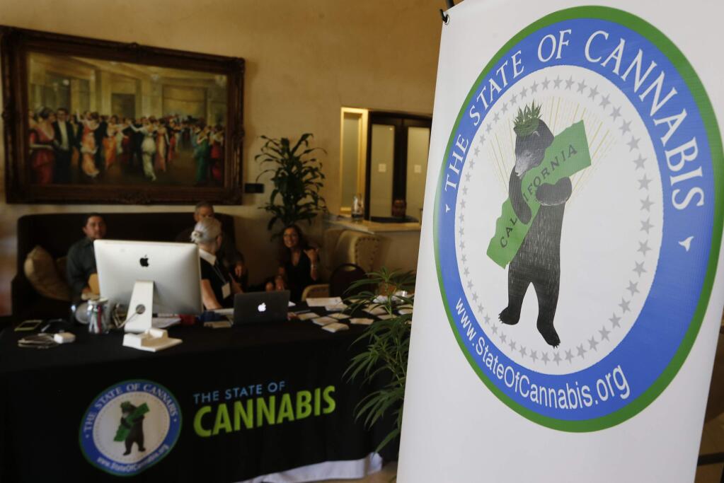 A banner for 'The State of Cannabis,' a California industry group meeting is displayed in a lobby of a hotel in Long Beach, Calif., on Thursday, Sept. 28, 2017. California's emerging marijuana industry is being rattled by an array of unknowns, as the state races to issue its first licenses to grow and sell legal recreational pot on Jan. 1. Proposition 64, which legalized recreational pot use for adults, takes effect next year. (AP Photo/Damian Dovarganes)