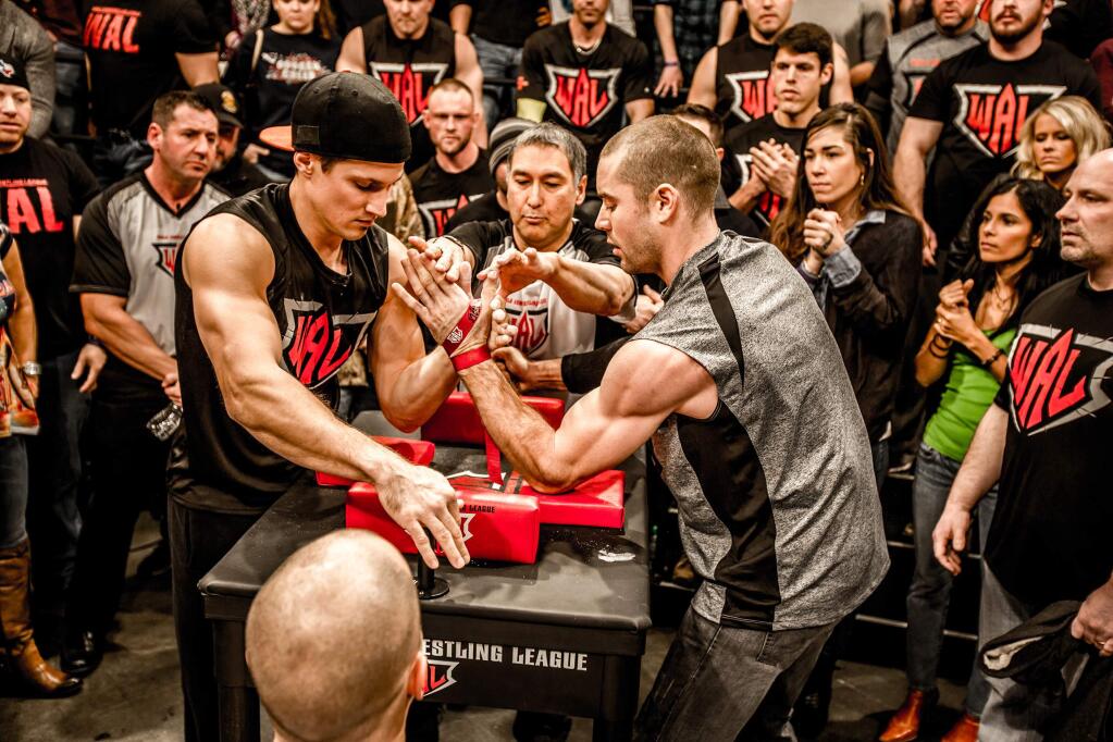PHOTO SUPPLIED BY LUKE KINDTLuke Kindt, left, shown in the Game of Arms competition, was a participant in the final World's Wristwrestling Championship held in Petaluma.