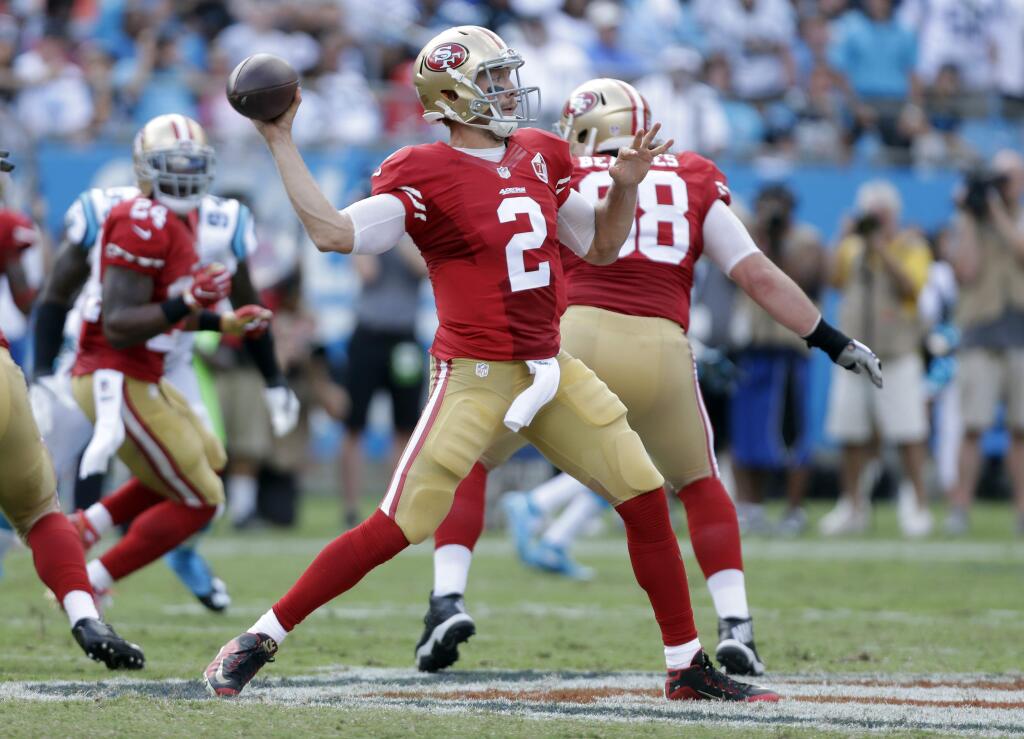 The San Francisco 49ers' Blaine Gabbert looks to pass against the Carolina Panthers in the second half in Charlotte, N.C., Sunday, Sept. 18, 2016. (AP Photo/Bob Leverone)