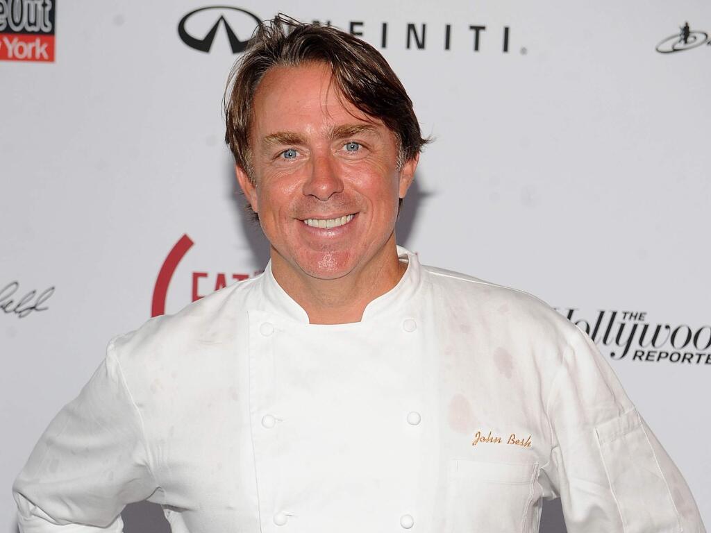 FILE - In this May 31, 2015 file photo, chef John Besh attends the Supper to benefit the Global Fund to fight AIDS in New York. Besh is stepping down from the restaurant group that bears his name after a newspaper reported that 25 current or former employees of the business said they were victims of sexual harassment. (Photo by Brad Barket/Invision/AP, File)