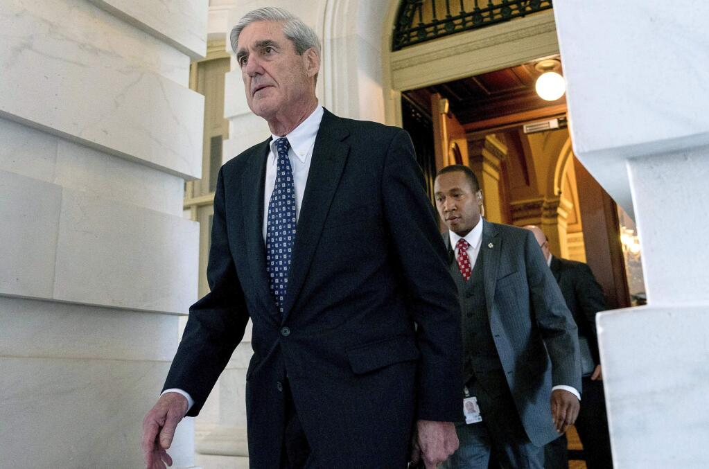 FILE - In this June 21, 2017, file photo, former FBI Director Robert Mueller, the special counsel probing Russian interference in the 2016 election, departs Capitol Hill following a closed door meeting in Washington. The special counsel's office wants to talk to Donald Trump about the firings of James Comey and Michael Flynn, but as the president's lawyers negotiate the terms and scope of a possible interview, they're left with no easy options. (AP Photo/Andrew Harnik, File)