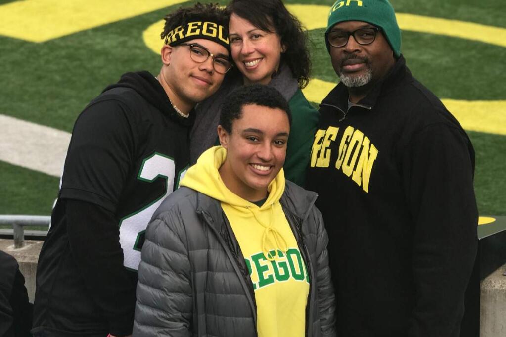 Mark Drafton at the University of Oregon with his wife, Wendy, daughter, Olivia, and son, Kona. (Drafton family)