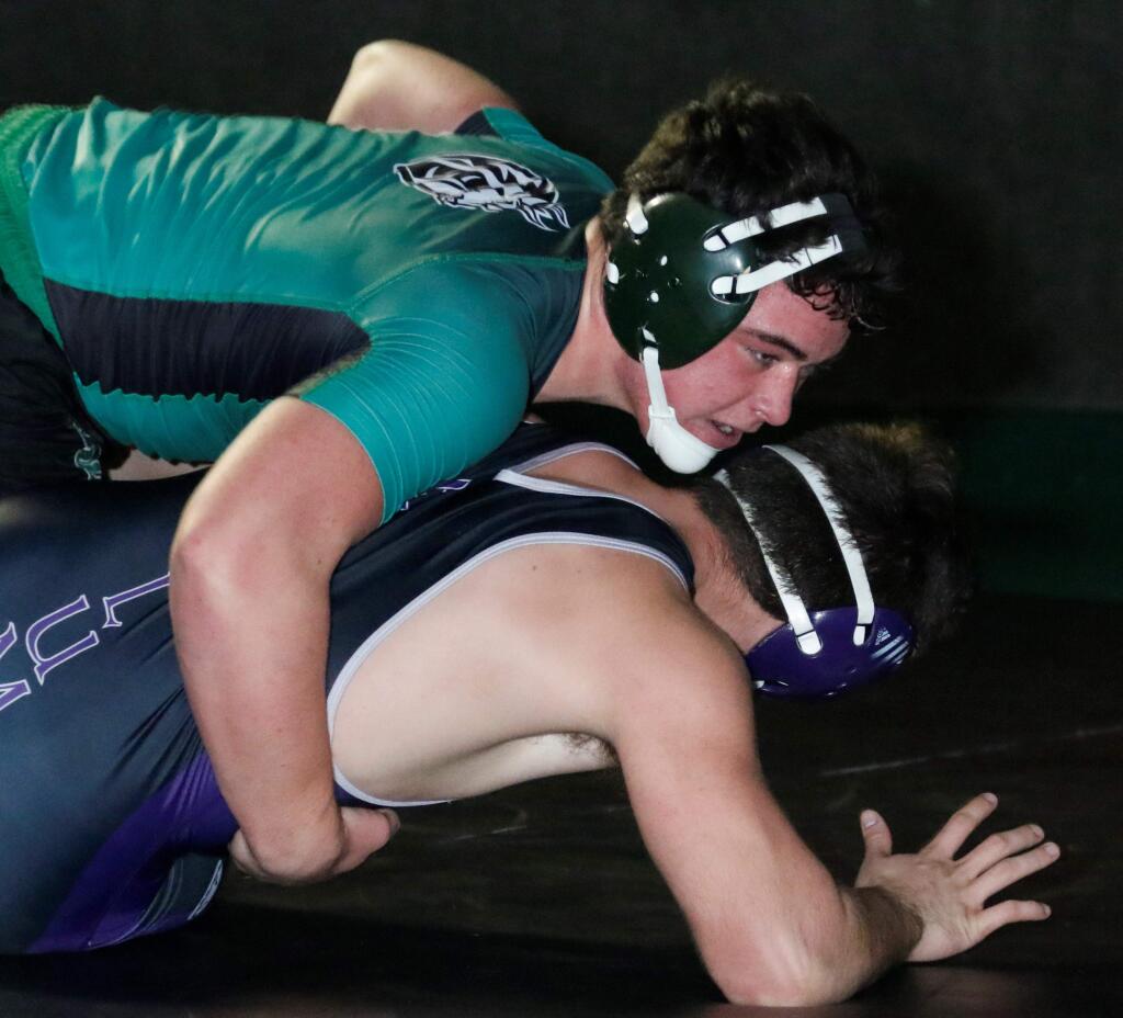 Hank Schoeningh gets the best of his rival during the Petaluma-SVHS dual on Wednesday, Jan. 9. Schoeninghs major decison gave the Dragons half of their points in the 60-16 loss to the Trojans, with Macklynn Liss the only other match winner, though Tyler Winslow won by forfeit. Sonoma Valley hosts the annual Deets Winslow Tournament on Saturday, Jan. 12, at Pfeiffer Gym, starting at 9 a.m.