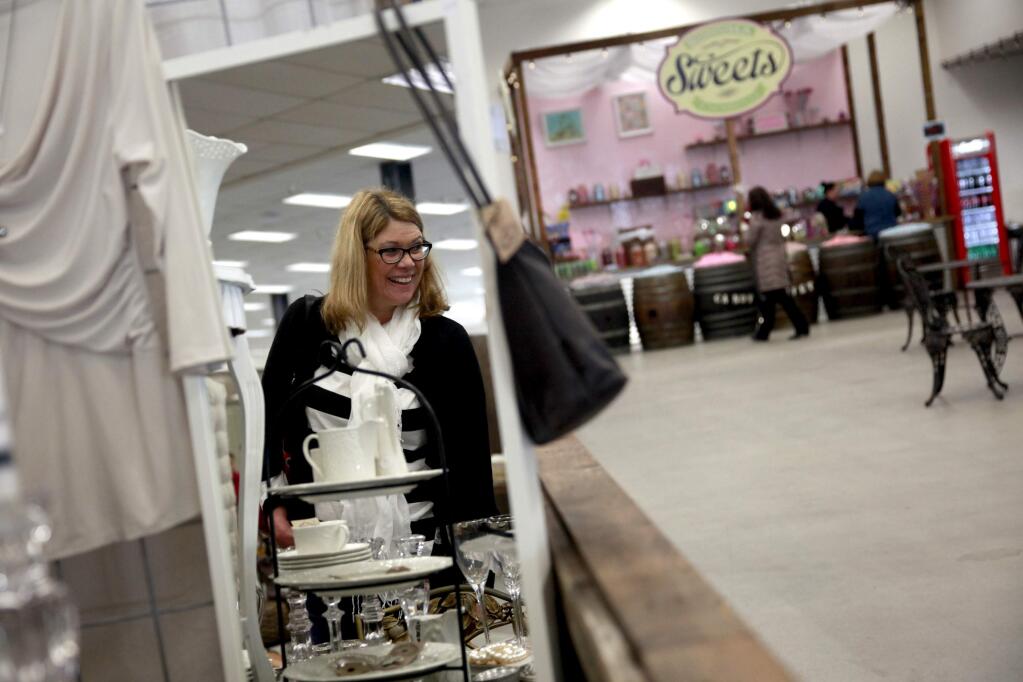 Sheryl Welter shops at the Sonoma Mountain Marketplace on Sunday, January 4, 2015 in Rohnert Park, California . (BETH SCHLANKER/ The Press Democrat)
