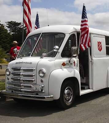Flags fly high on the Salvation Army truck.