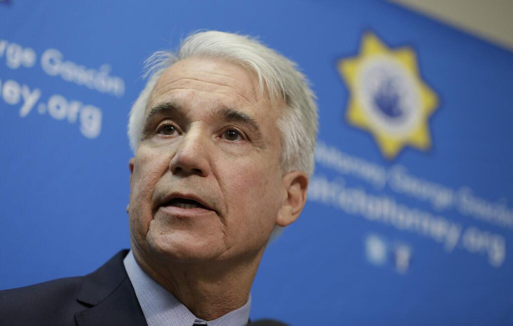 FILE - In this Dec. 9, 2014 file photo, San Francisco District Attorney George Gascon speaks during a news conference in San Francisco. San Francisco's district attorney says his office will toss out or reduce thousands of marijuana criminal convictions dating back decades, which a 2016 ballot measure legalizing recreational use of the drug in California allows. Gascon announced Wednesday, Jan. 31, 2018, that his office will review nearly 5,000 felony cases for possible action and automatically seal 3,000 misdemeanor cases. (AP Photo/Eric Risberg, File)