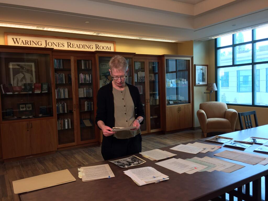 Lynn Prime, special collections librarian at Sonoma State University's Schulz Information Center, offers a C-SPAN television crew a look at primary source history of the Dust Bowl migration of the Depression era for the upcoming Cities Tour on C-SPAN3. (Courtesy of C-SPAN)