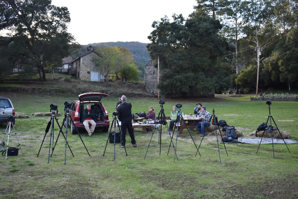 Students in photographer Ray Mabry's class 'Light Painting' prepare equipment for the shoot in Jack London State HIstoric Park, while it's still light out. (photo by Tracy Salcedo)