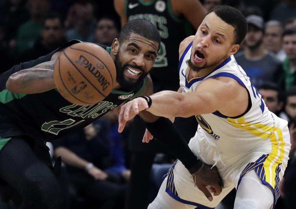 Golden State Warriors guard Stephen Curry, right, attempts to steal the ball from Boston Celtics guard Kyrie Irving in the fourth quarter, Saturday, Jan. 26, 2019, in Boston.