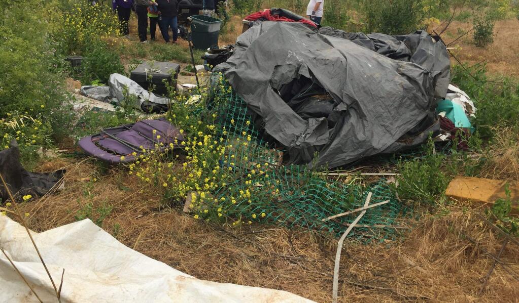 The Petaluma Police Department joined representatives from homeless service organizations in the removal of several large-scale encampments south of Hopper Street on June 6. (Image courtesy Petaluma Police Department)