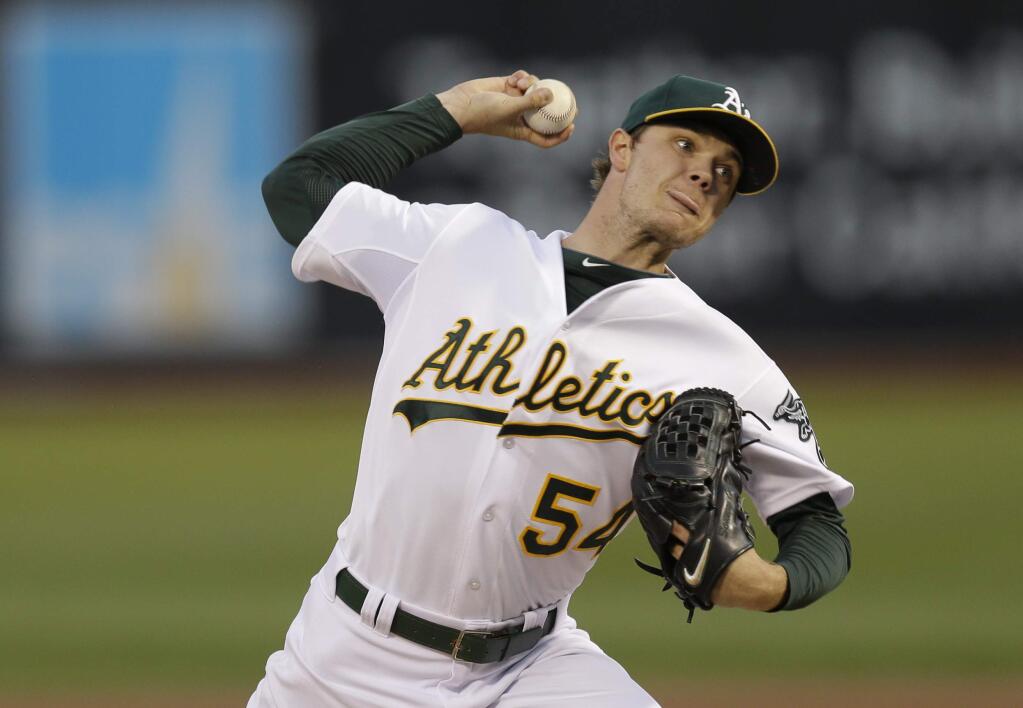 Oakland Athletics pitcher Sonny Gray works against the Houston Astros during the first inning of a baseball game Tuesday, Sept. 8, 2015, in Oakland, Calif. (AP Photo/Ben Margot)